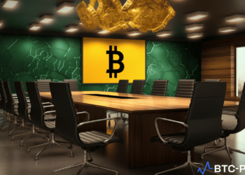 Binance logo and Nigerian flag displayed during a meeting, symbolizing the controversy around foreign investment.